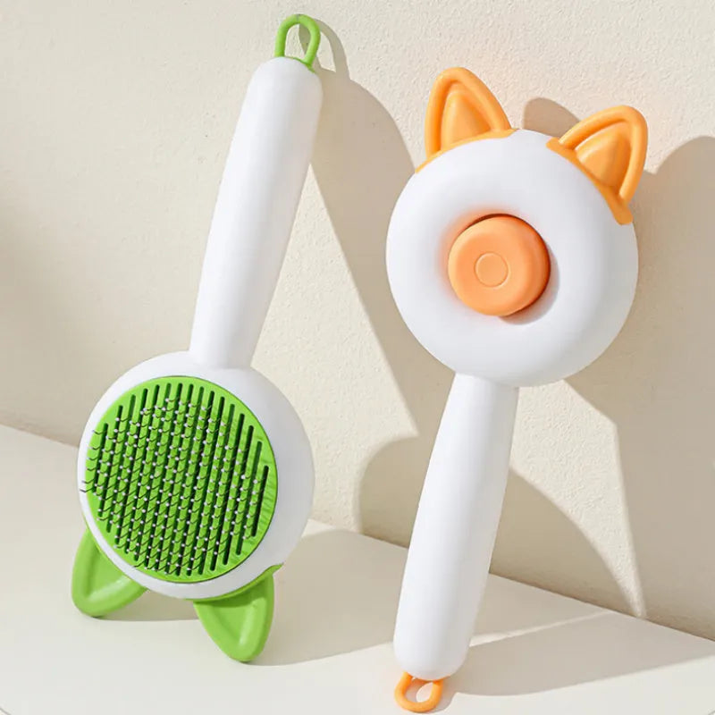 Self-cleaning pet grooming brush with stainless steel teeth and TPR massage nodes in greenish white colour.