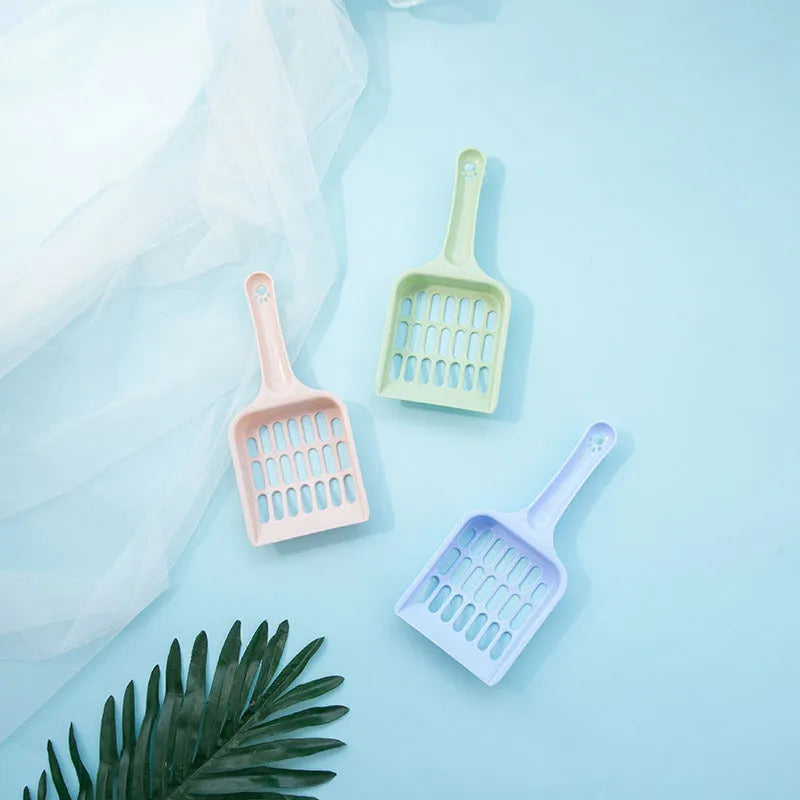 Plastic cat litter shovel in pink, 19.5x8x2.5cm, for small cleaning tasks