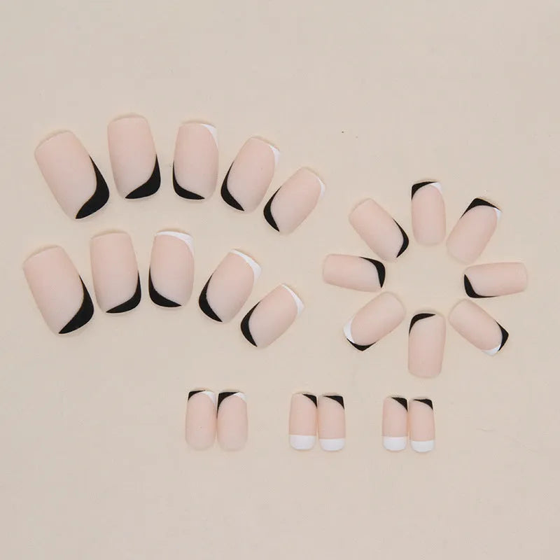 W644 black and white frosted false nail glue set with plastic pieces for a French manicure.