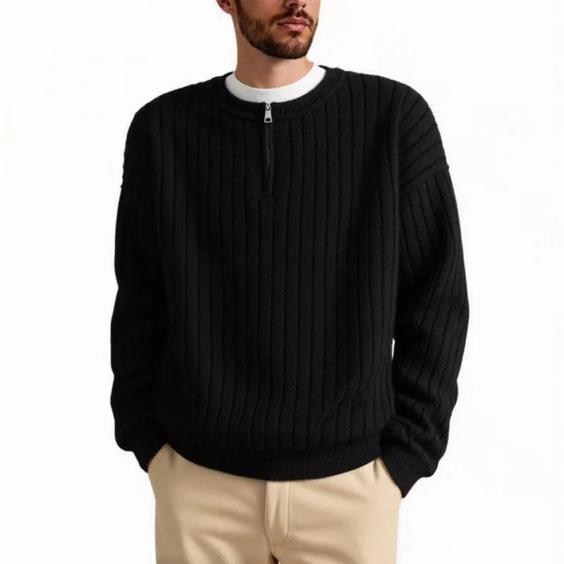 Grey half-zip loose knit sweater for men with long sleeves on a hanger.