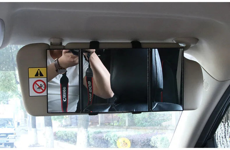 Silver car folding makeup mirror shown closed at 15.5cm width and opened at 30.5cm width