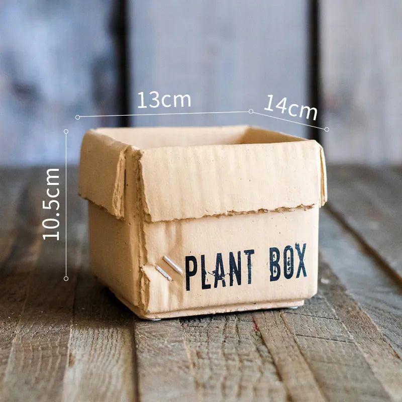 Cement flowerpot with bottom drainage holes and paper box texture in Nordic style design