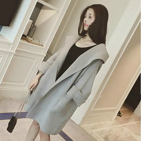 Plus size woman modelling a loose grey lace-trim thin cotton coat for spring and autumn.