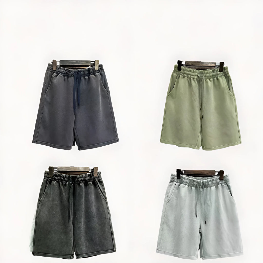 A pair of men's light blue distressed casual cotton shorts with a loose, straight-leg fit on a plain background.