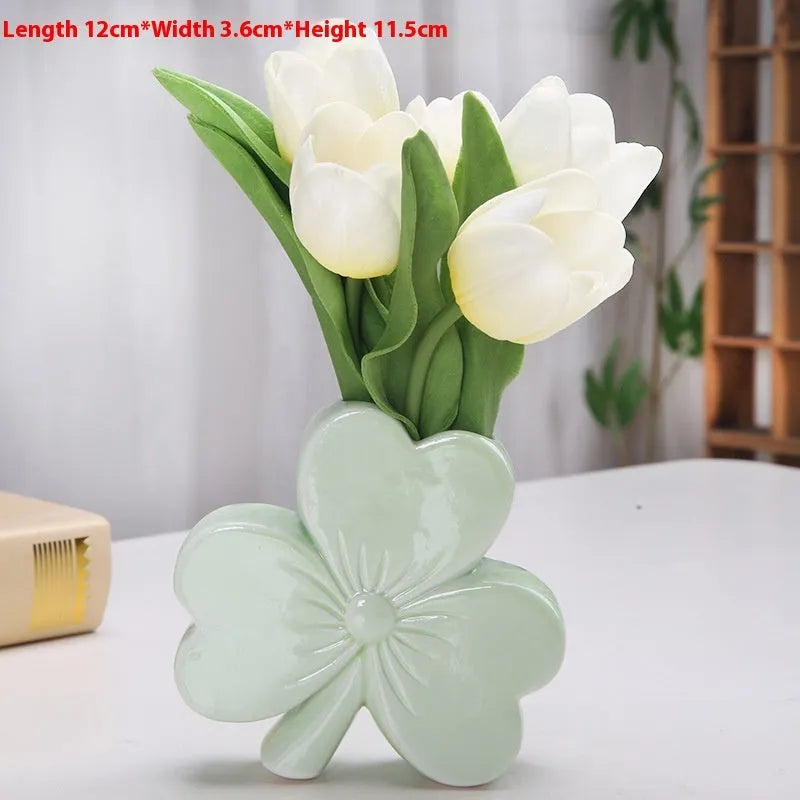 Clover-shaped white porcelain ceramic vase in light green, pink, red, or white colour.