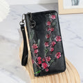 Chinese style floral embossed zipper handbag in black with hand-painted details