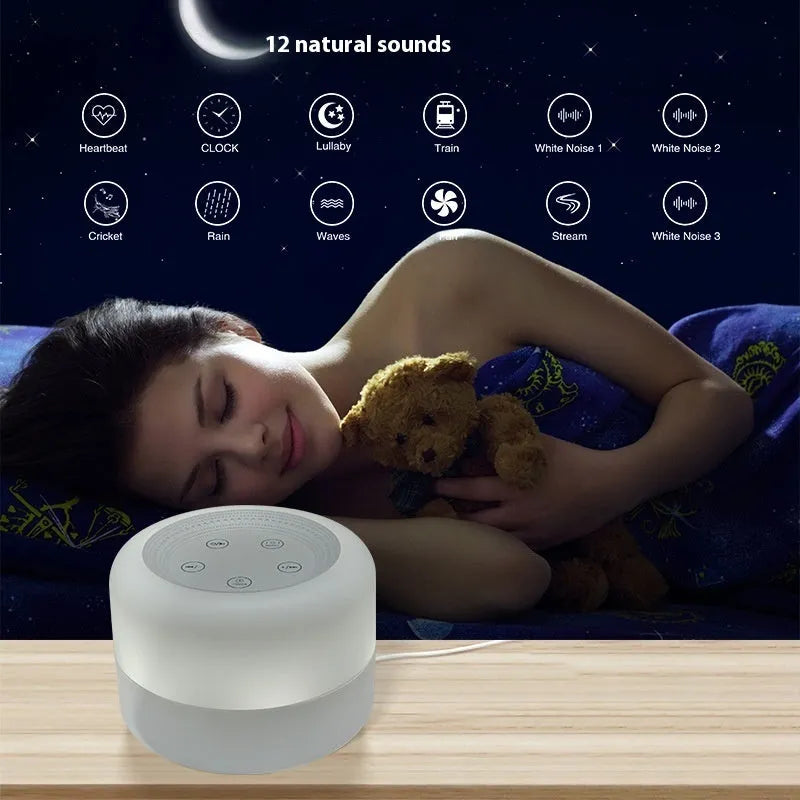 White rechargeable white noise sleeping aid table lamp with colourful lights on bedside table