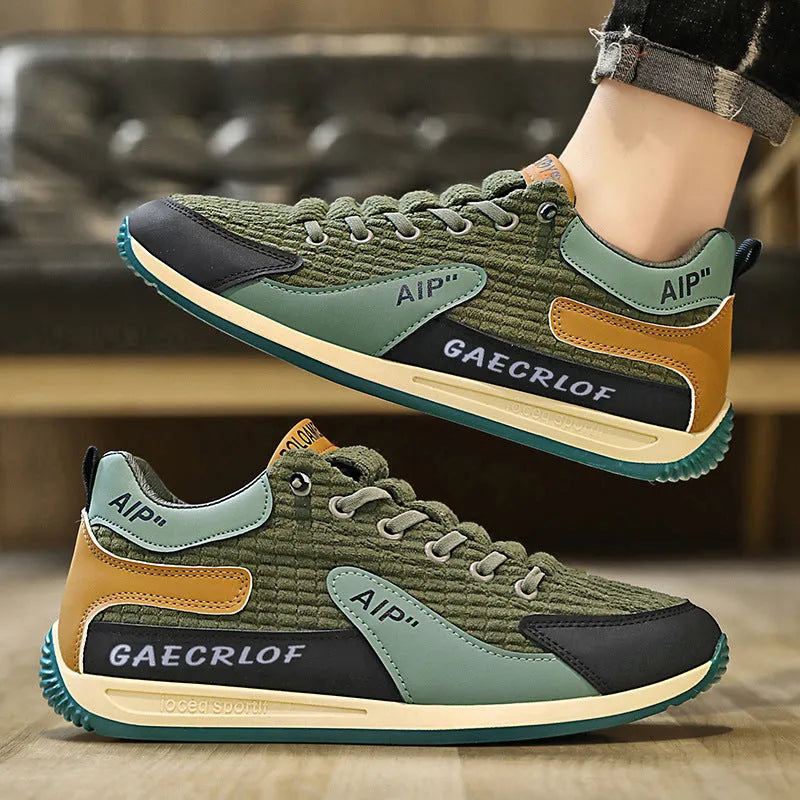 Men's grey and green lightweight mesh running shoes with round toe and lace-up front