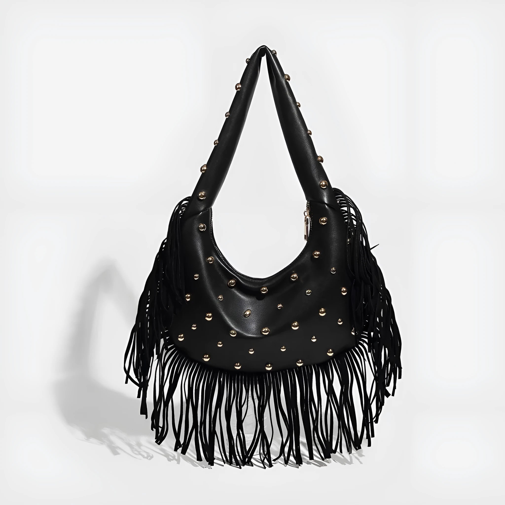 Retro black tassel shoulder handbag showing internal mobile phone pocket and decorative tassel detail.