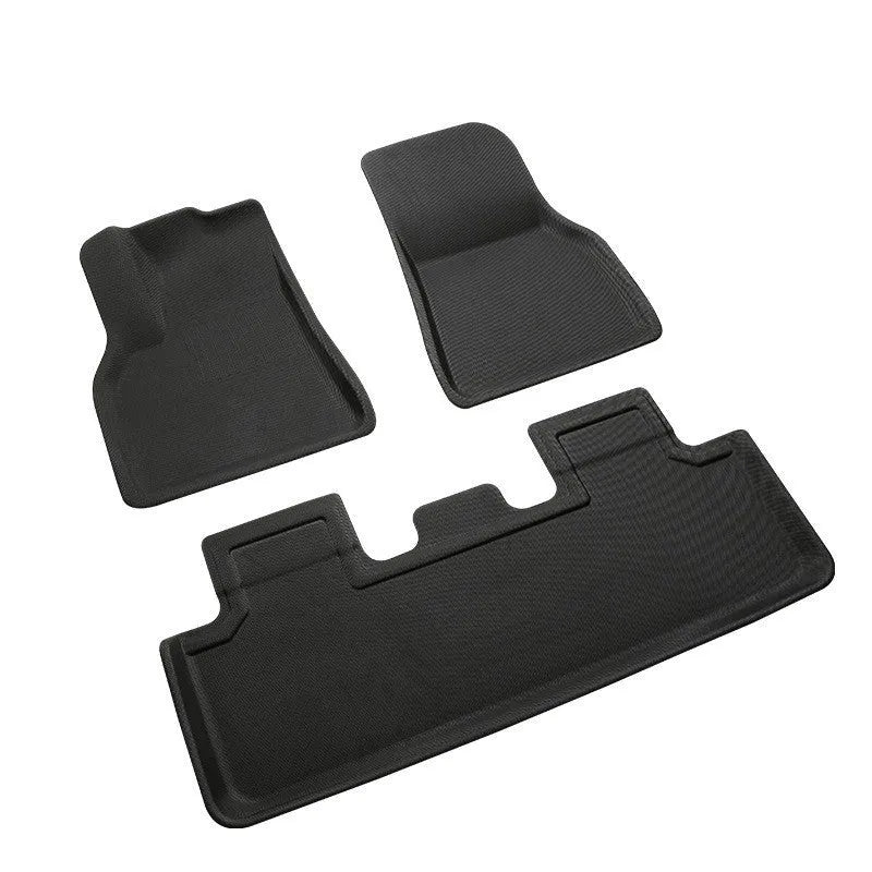 TPR floor mat set for Tesla Model Y showing footrest, tailbox, and front storage mats