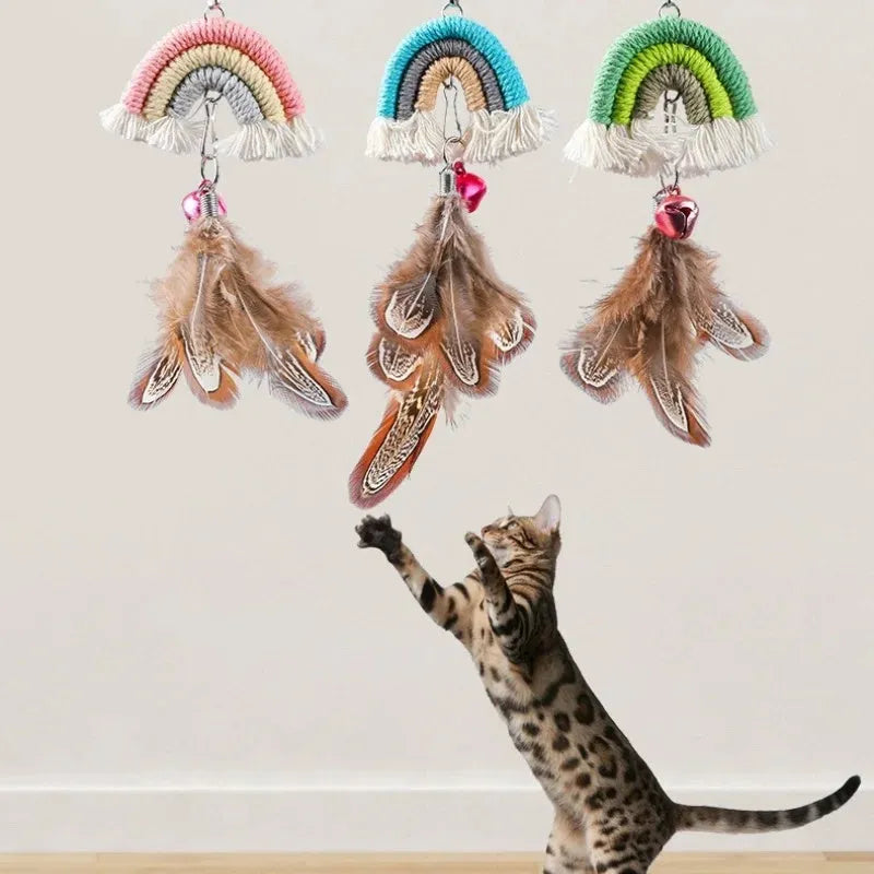 Blue feather cat toy hanging from door with elastic rope and sticky buckle clamp for interactive play