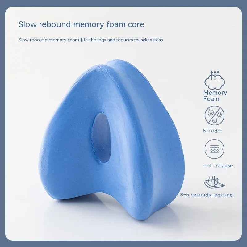 Heart-shaped memory foam leg pillow in blue colour showing 25x23x13cm dimensions