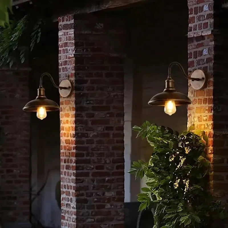 Retro style villa courtyard wall lamp in copper finish with oblique angle mounting