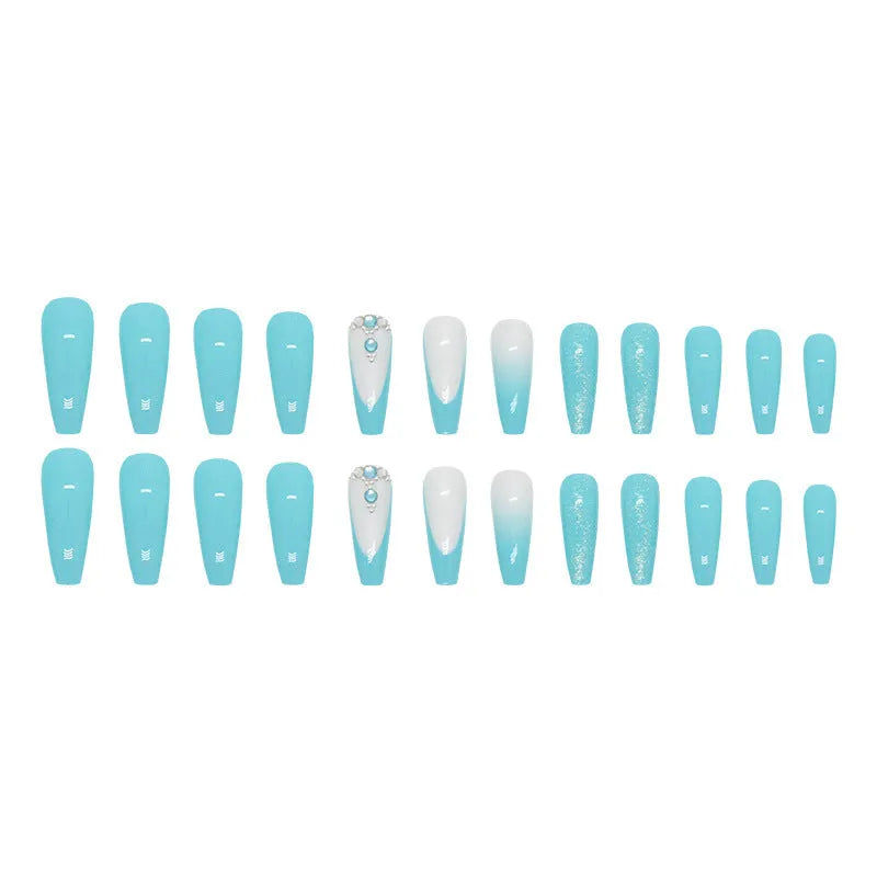 Long ballet shape false nails with solid blue colour and smart blue diamond design, shown with adhesive glue.