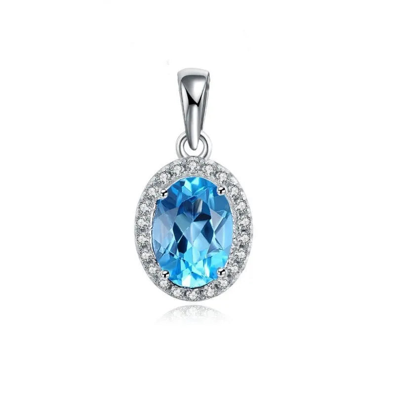 925 sterling silver jewellery set with blue topaz gems showing geometric patterned necklace, earrings, ring and pendant