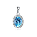 925 sterling silver jewellery set with blue topaz gems showing geometric patterned necklace, earrings, ring and pendant