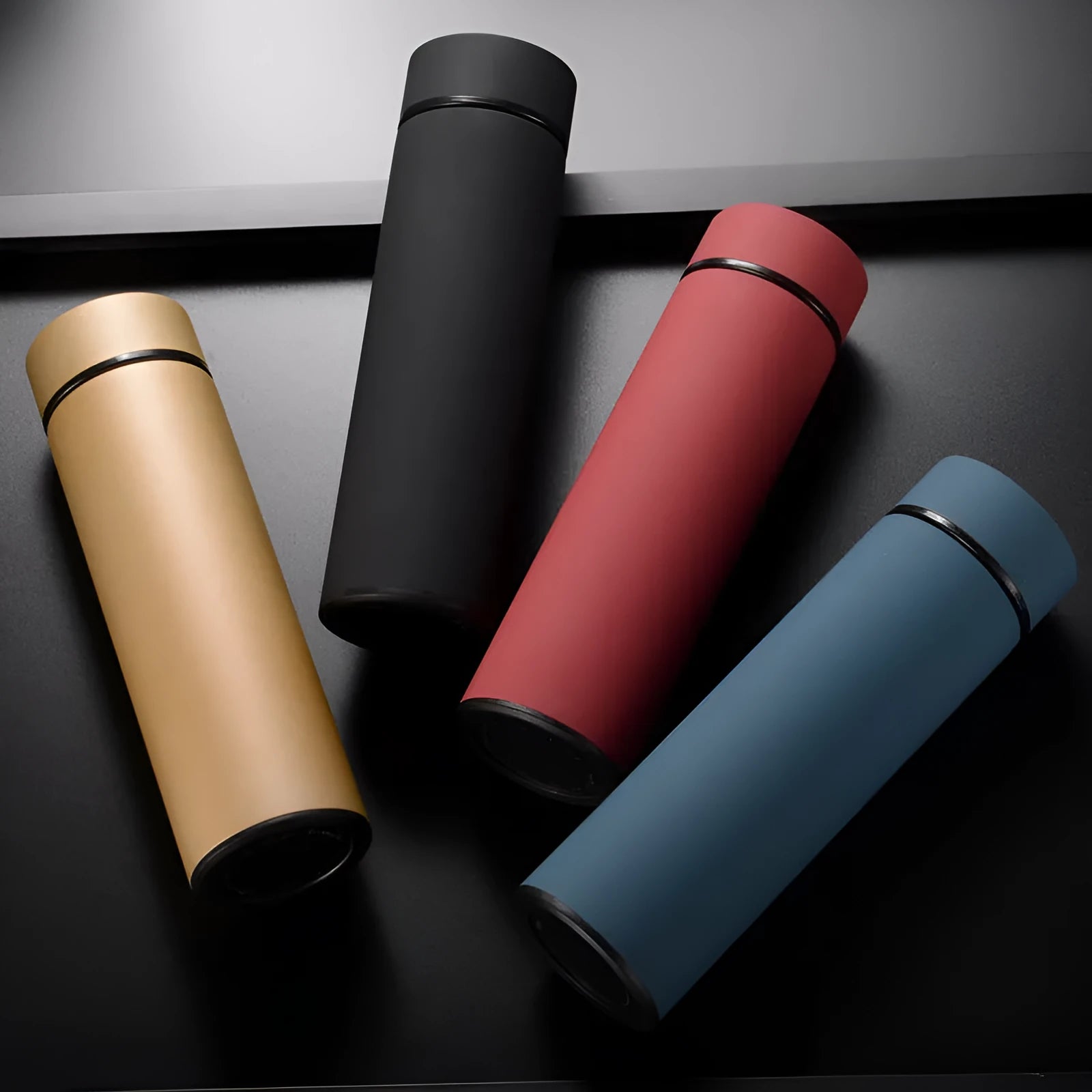 450ml stainless steel vacuum insulated water bottle in black, red, gold, or blue with arrow mouth