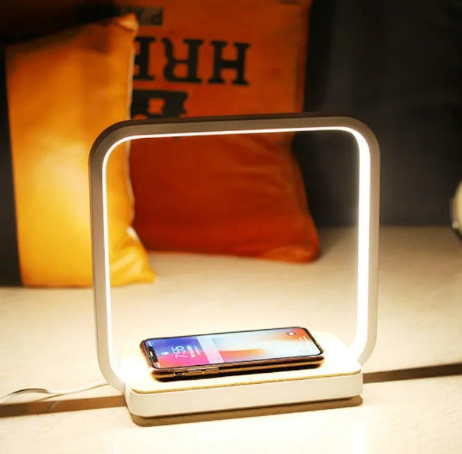 White plastic touch control LED lamp compatible with iPhone on a nightstand