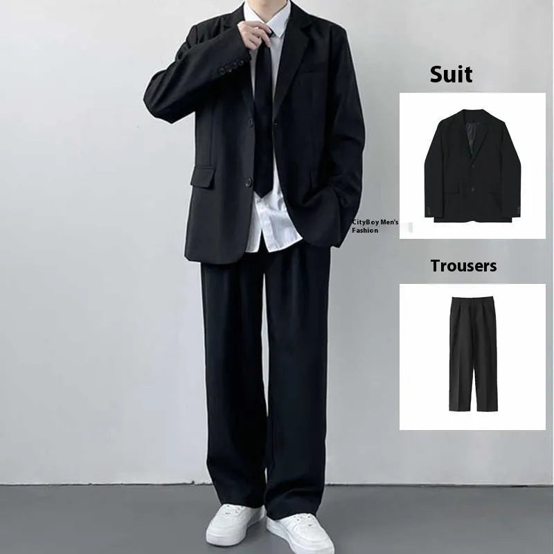 Men's plus size college style suit set in grey, featuring a blazer, trousers, white shirt, and tie.
