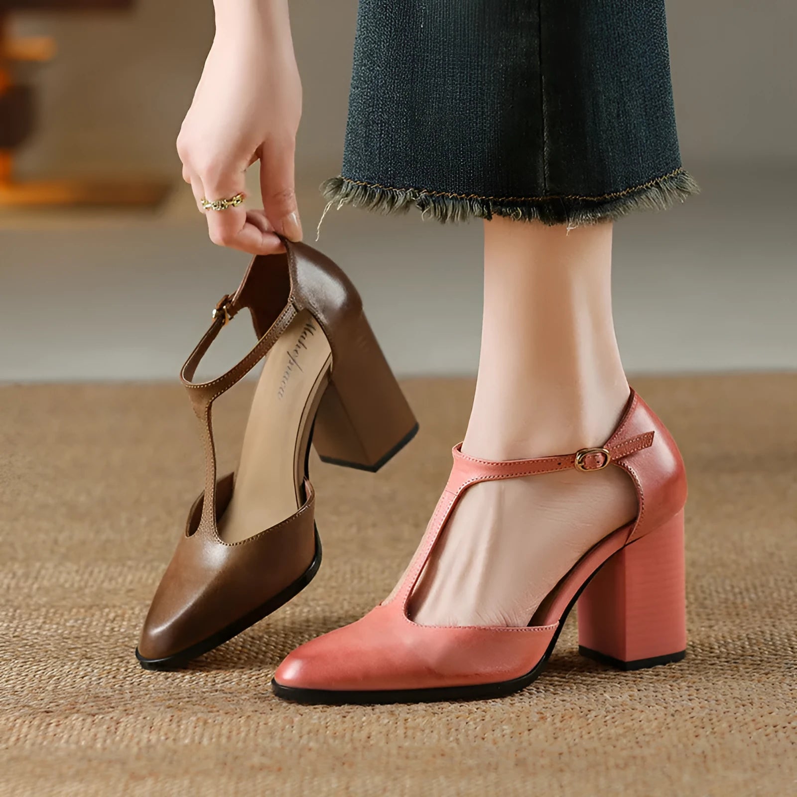 Women's dark brown retro pointed toe Mary Jane shoes with a buckle strap and hollow baotou design.