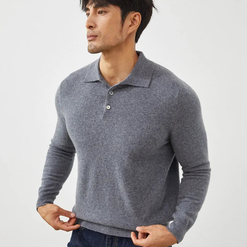 Man wearing a sapphire blue cashmere polo collar pullover sweater with a loose fit.