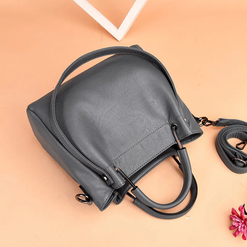 Korean fashion women's soft PU retro bucket handbag medium size solid colour with zipper closure