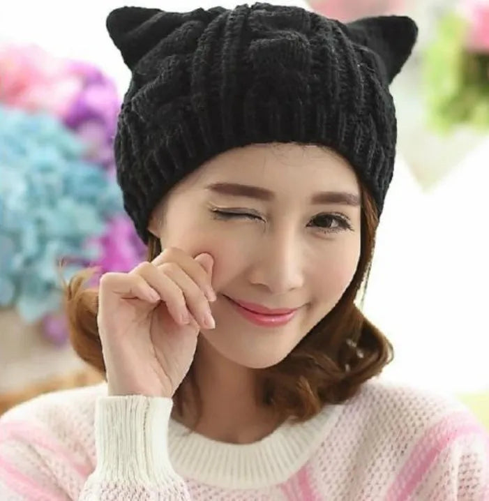 Hand knitted wool cat ear beanie in red colour for winter wear