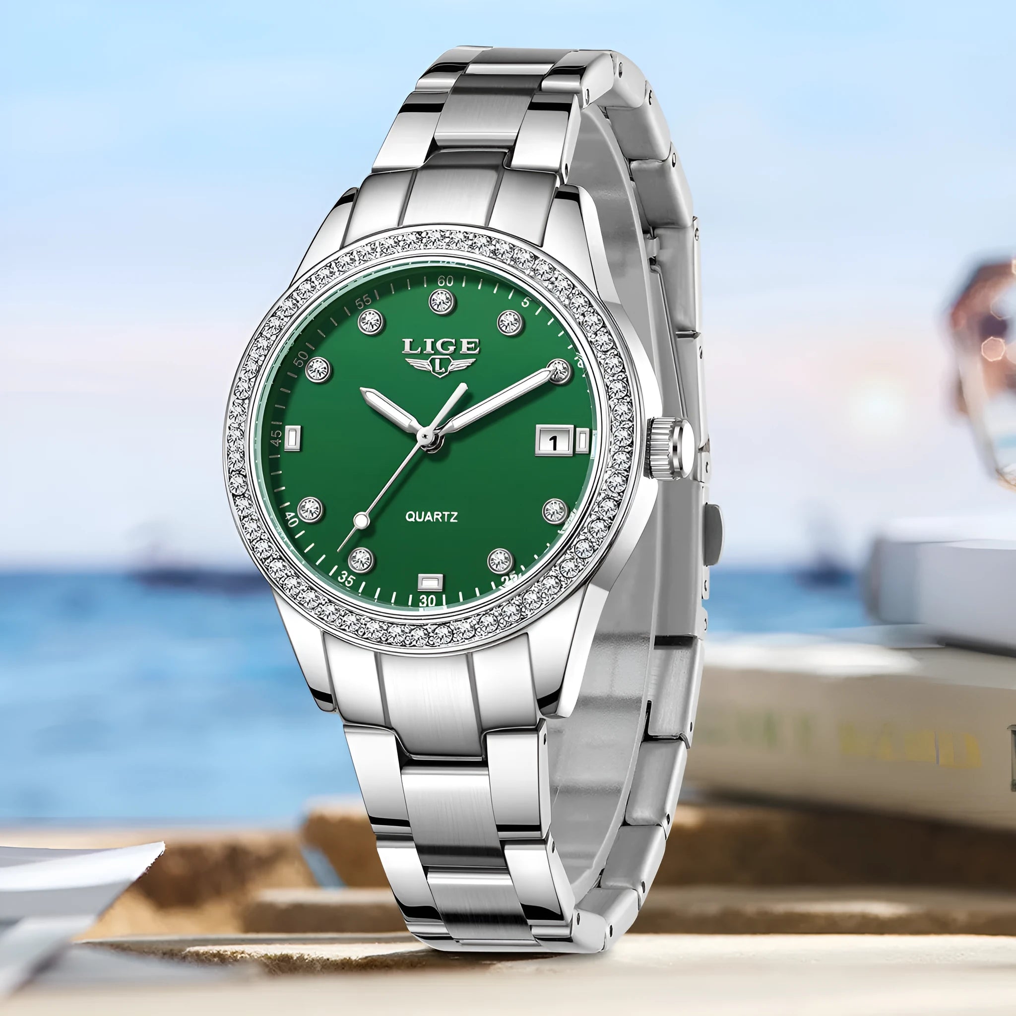 Silver fashion quartz watch with diamond-encrusted dial, stainless steel case, and luminous hands
