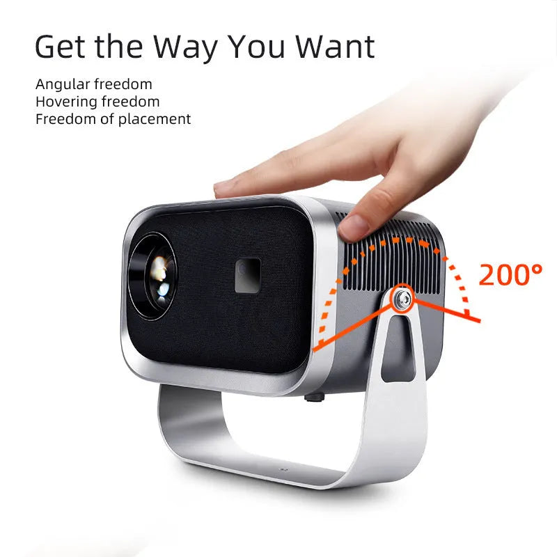 Home HD Portable Projector with bracket on table showing movie scene on wall