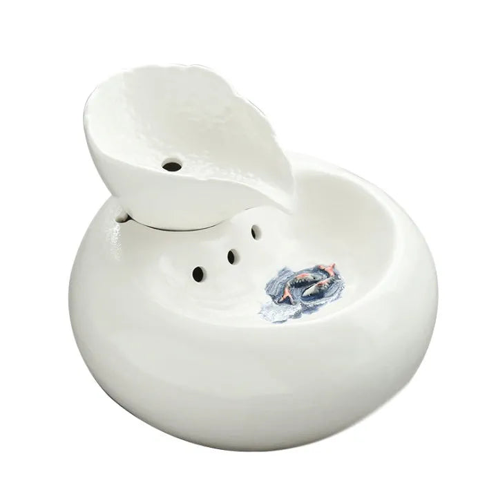 White ceramic automatic cat water dispenser with leaf-shaped bowl and pump