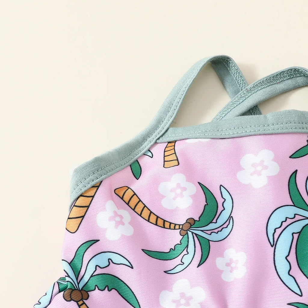 White children's two-piece polyester swimsuit set with top and shorts on a hanger.