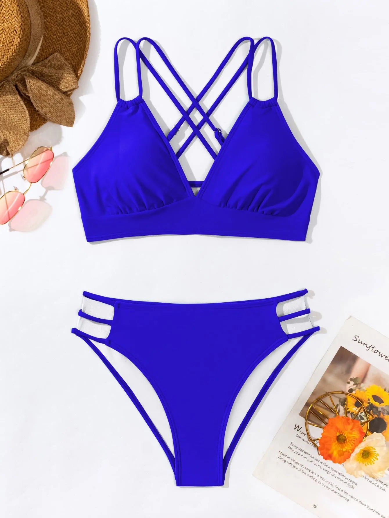 Women's black V-neck halter bikini swimsuit with matching shorts on a mannequin
