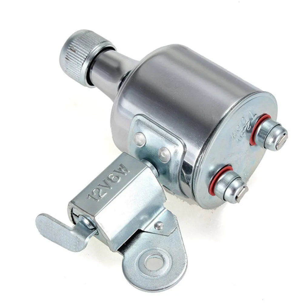 Silver aluminium bicycle dynamo light kit mounted on a bike fork for friction-powered lighting.
