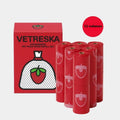 Portable plastic capsule dispenser for scented dog poo bags in strawberry, orange, and cherry blossom designs.