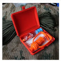 Orange venom extraction suction device with storage box, suction pump, two suction cups, and first aid accessories for outdoor emergencies