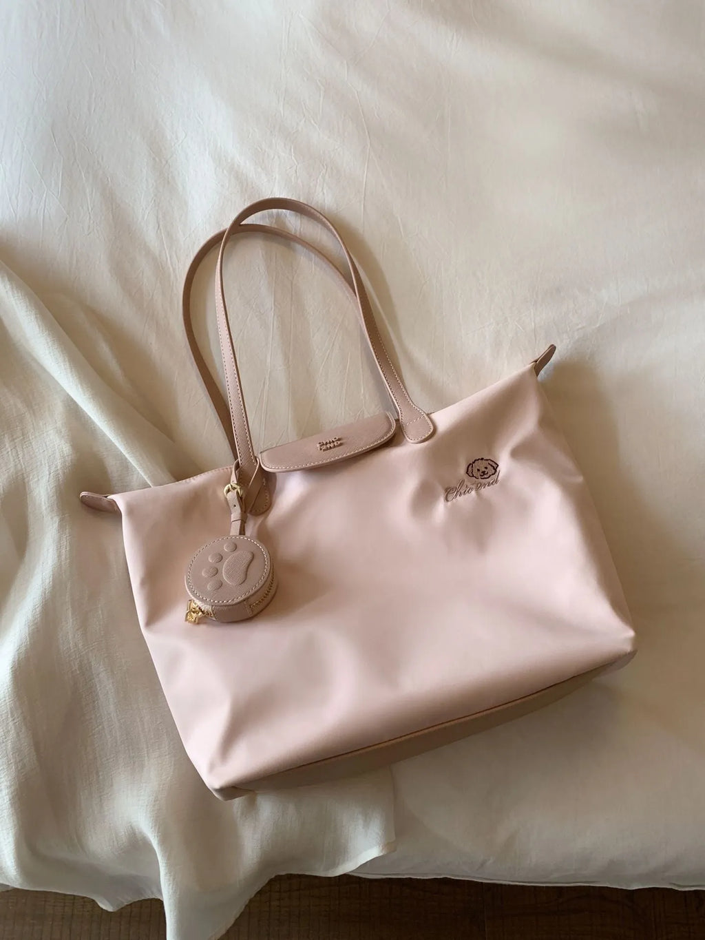 Large capacity Oxford cloth tote shoulder bag in pink with sandwich pocket and mobile phone pocket design
