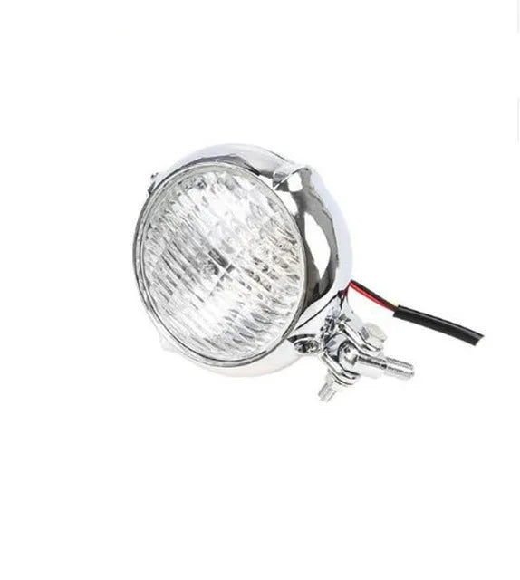 Black electroplated Harley-style halogen headlight with an 8 cm diameter lens.