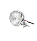 Black electroplated Harley-style halogen headlight with an 8 cm diameter lens.