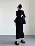 Women's long sleeve hooded sheath dress in light grey, shown over-the-knee length.