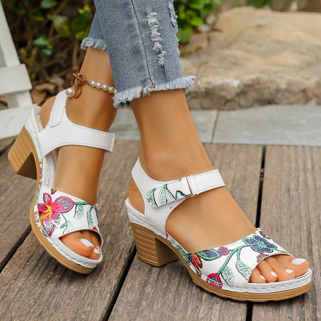 White women's high-heel casual sandals with an adjustable Velcro strap buckle.