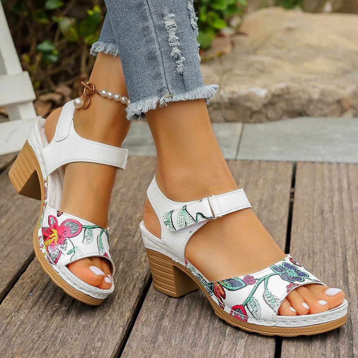 White women's high-heel casual sandals with an adjustable Velcro strap buckle.