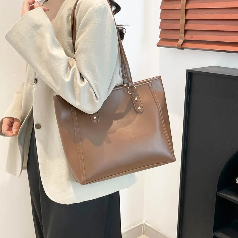 Niche Korean style horizontal square shoulder underarm bag in PU leather, shown in black.
