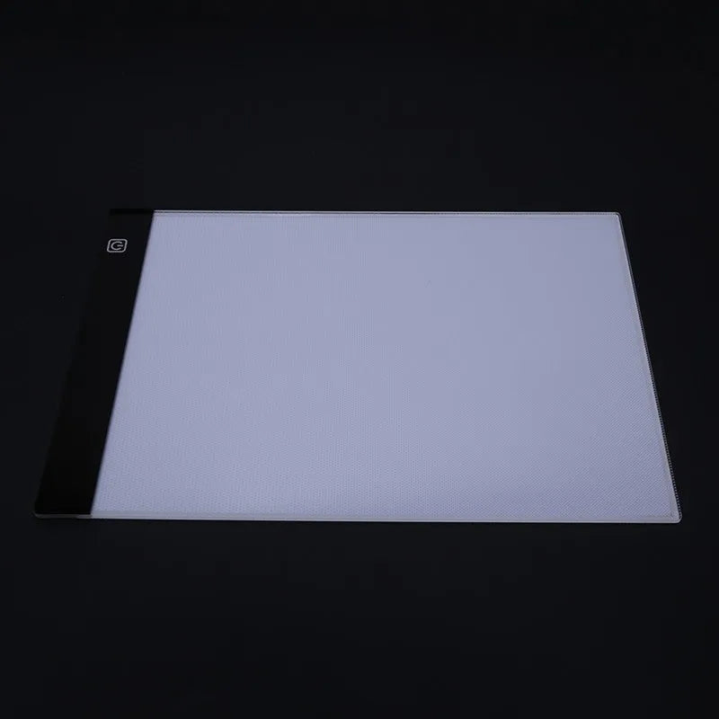 LED artist tracing table with A4 acrylic screen, USB dimming, and touch switch on a desk
