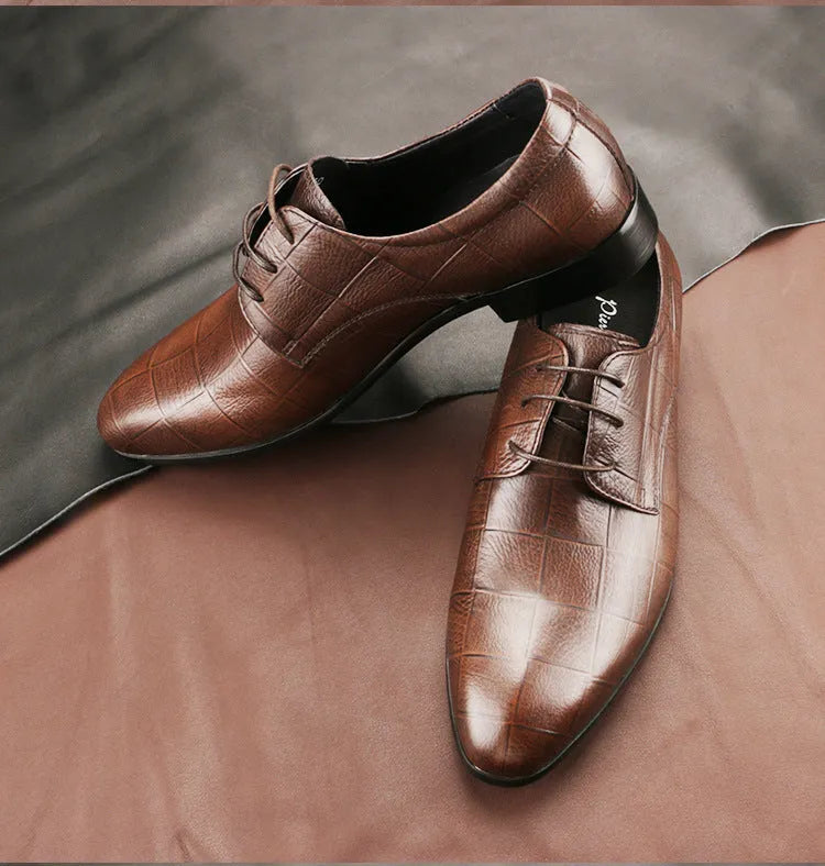 Men's black leather Derby shoes with checkered pattern detailing and pointed toe caps