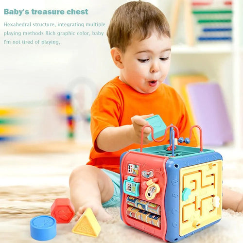 Multicoloured baby hexahedron educational toy cube showing bead maze, gear, and car maze activity faces