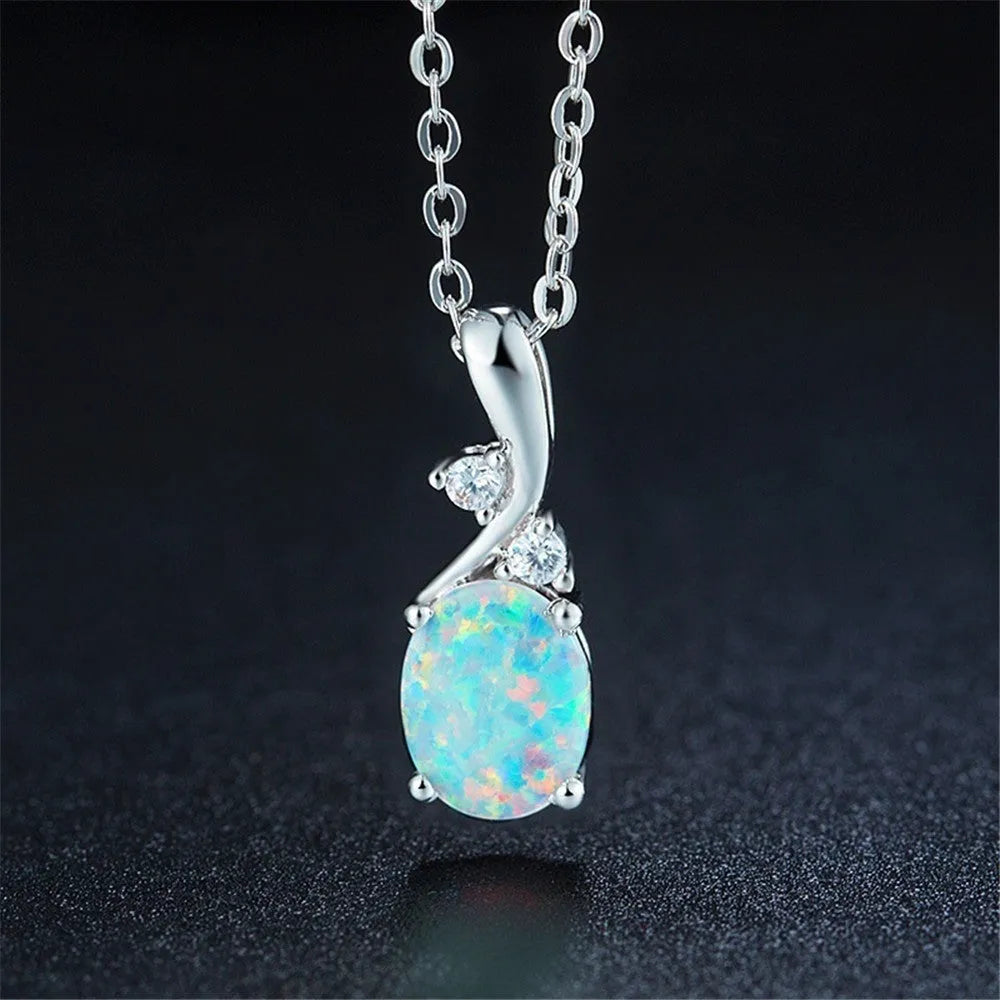 Water drop shaped opal pendant necklace on O-shaped chain in rose gold or white finish