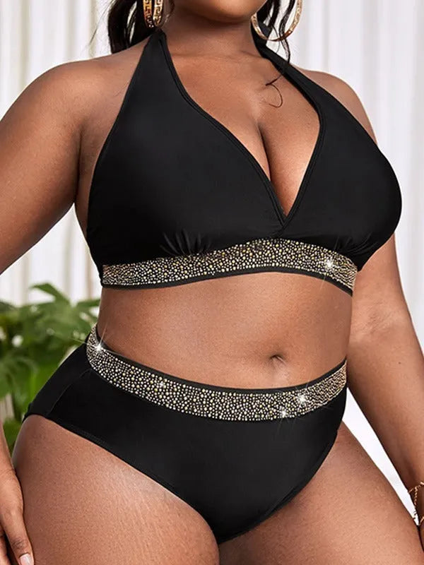 Black plus size women's bikini swimsuit with bra and shorts on a mannequin.