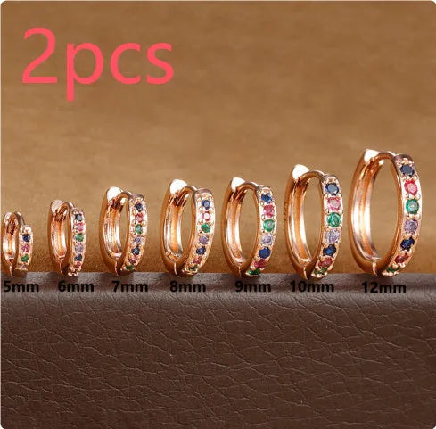 Circle geometric zircon stud earrings in gold, rose gold, or silver colour on a copper base.