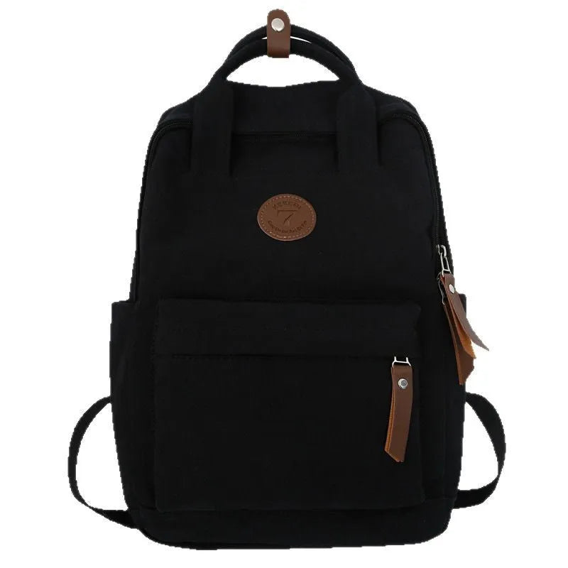 Black oxford cloth fashion backpack with curved shoulder straps and urban simplicity design