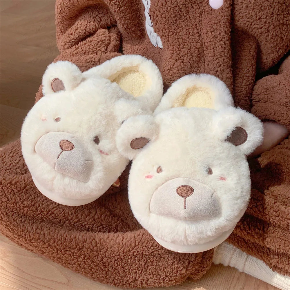 Women's plush slippers with suede upper, fleece lining and cartoon pattern in round toe design